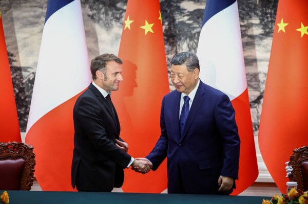 Macron calls on France and China to overcome differences